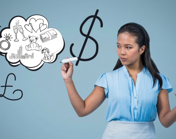 Woman in blue shirt calculating expenses and savings with currency symbols and dream cloud sketches