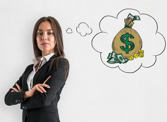 A woman in a business suit contemplates financial matters, with a thoughtful expression on her face