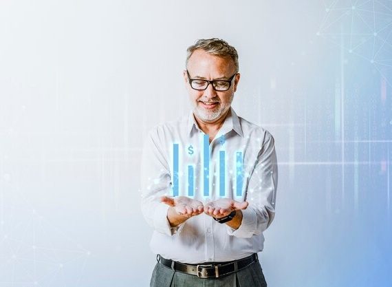 Businessman presenting a graph chart, illustrating data trends and performance metrics in a professional setting